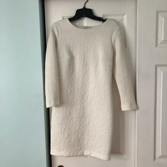 White long sleeve mini dress from Dynamite
